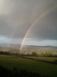 Double rainbow, full arc, right the whole way across the landscape below Craig Y Dorth.